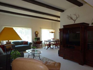 3 LIVING RM OPEN TO DINING AREA