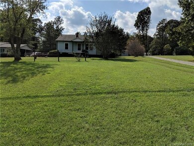 Front of Home Standing Close to Hwy