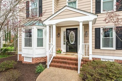 Covered front porch with lead glass window
