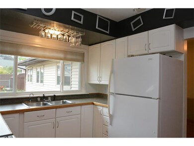 The kitchen is awesome!  It's a great work space with a counter directly across from the window.  You can see the whole backyard from the window.  It's so pretty!