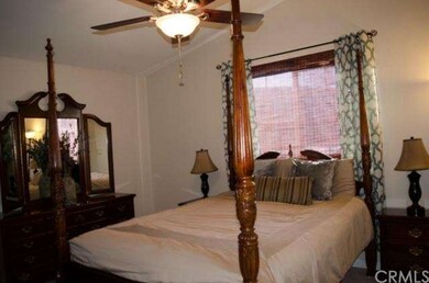 Master bedroom with ceiling fan