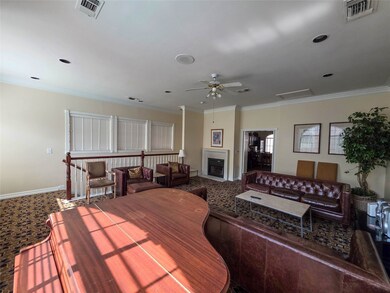 Elegant clubhouse with cozy seating, a grand piano