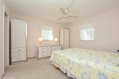 07_724SWLakeCt_14_MasterBedroom_HiRes
