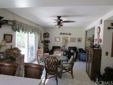 Family room. newer energy efficient sliders. Cover