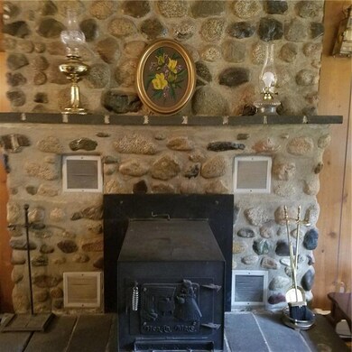 Stone hearth with wood stove