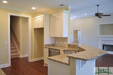 The kitchen is open to the great room and features
