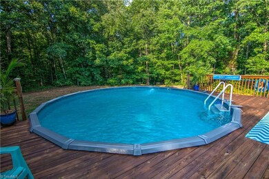 Pool, 4 ft. deep with extensive decking