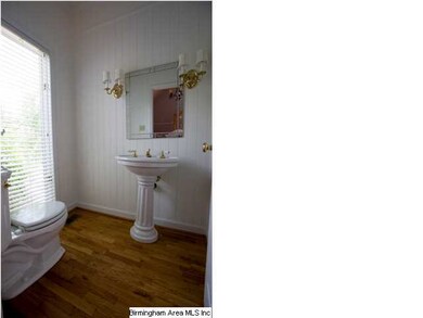 Stairway leading upstairs to the two large bedroom