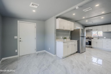 Front Door & Kitchen