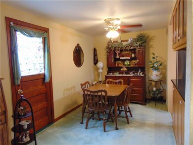 Door to side yard off dining area.