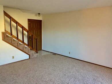 Main floor living room and front door