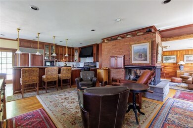 Relax by the gas fireplace in this cozy family roo