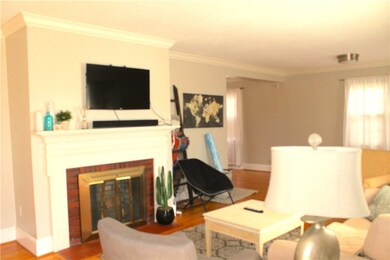 Living Room w/ wood burning fireplace