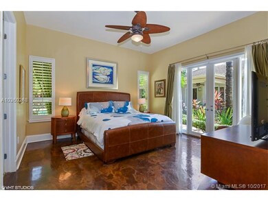 Master bedroom with gorgeous views of pool and cou