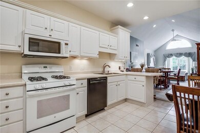 Kitchen with Peninsula opens to Dining/Living Room