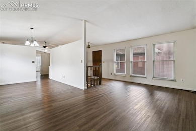 Large formal living room is adjacent to the formal dining room.