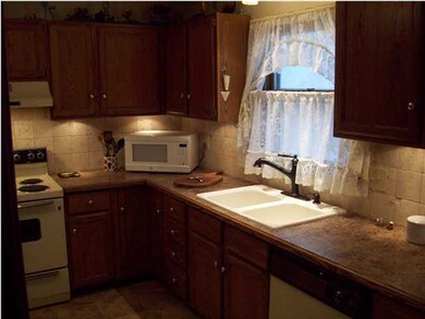 Many Cabinets in applianced kitchen...