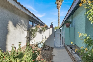 Side gate leading to the backyard