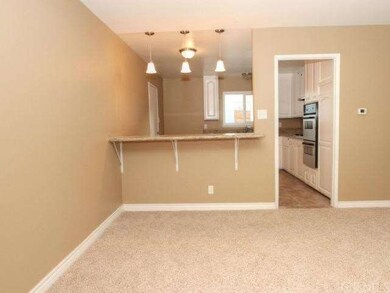 View of kitchen from formal dinning area