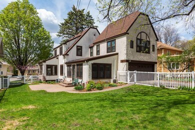 Beautifully landscaped yard offers a variety of pe