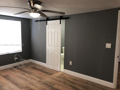 Space saving Barn door from bedroom to bathroom.
