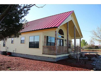 Exterior Front. Big front porch on front and back,
