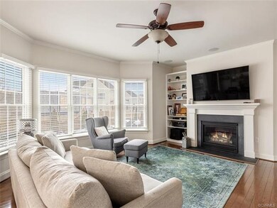 Family room with gas fireplace and built-in bookshelf