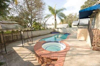 Rear patio, pool, jacuzzi
