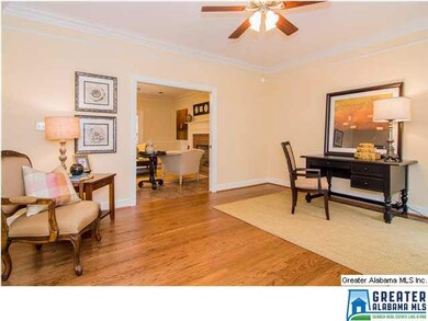 Formal living room with sparkling hardwood floorin