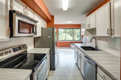 Kitchen has been recently updated with fun new cou