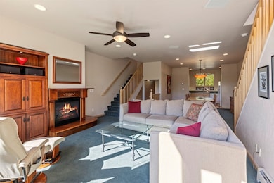 Main-level living room with seamless flow to kitch