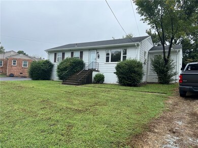 View of front facade with a front lawn