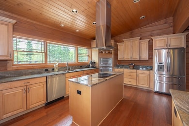 Kitchen with stainless steel appliances, island ex