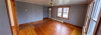 Come on in to the living room, wood floors, newer 