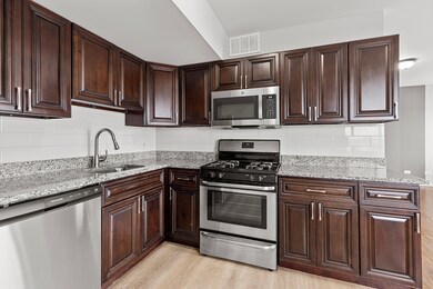 2451 W Howard St unit 112, Chicago, IL 60645 - photo 4