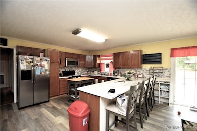 Updated cabinets, counter top and appliances
