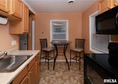 7428 N Oak St, Davenport, IA 52806 - photo 5