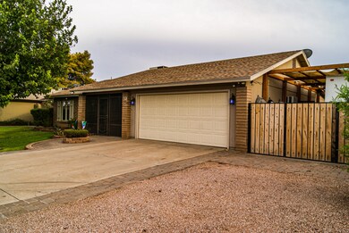 front of home with rv gate