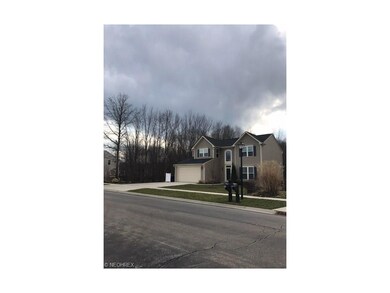 view of empty lot between houses, no close neighbo