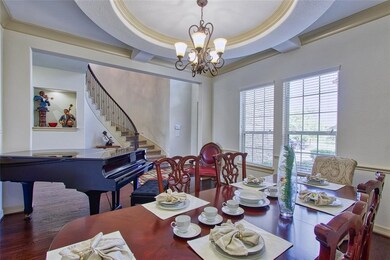 Formal dining so spacious, it holds a grand piano!