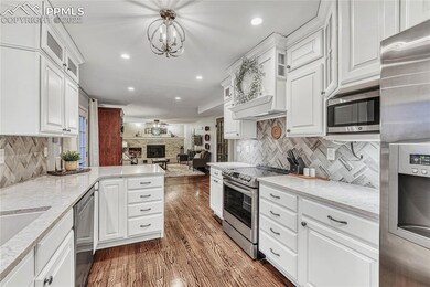 Kitchen with updated backsplash tile work & stainl