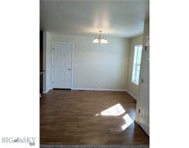 Dining room. Photo of similar home.