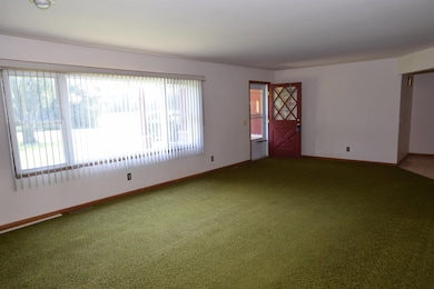 The picture window is newer, however will require you to add finish molding to complete. The blinds will be included with the home.  A great room for gathering on holidays or just entertaining family & friends.