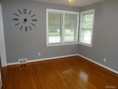 Bedroom 2 has beautiful hardwood floors