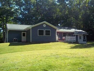 Back Lawn and Rear View of Home