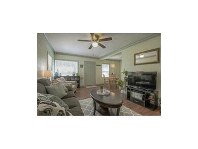 Soft color palette and wide crown moulding give th