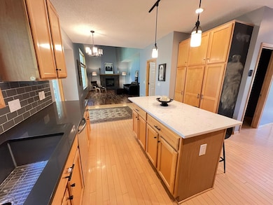 View from kitchen to 2 story great room