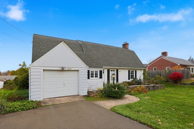 Note driveway extension on left