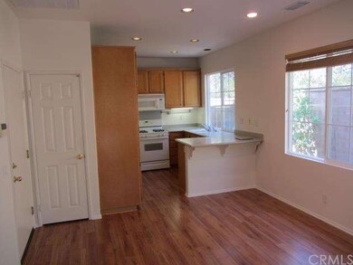 Kitchen opens up to dining area and living room. D