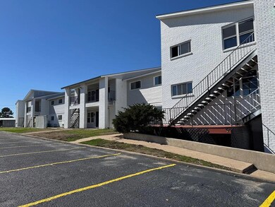 Uncovered parking lot featuring stairway